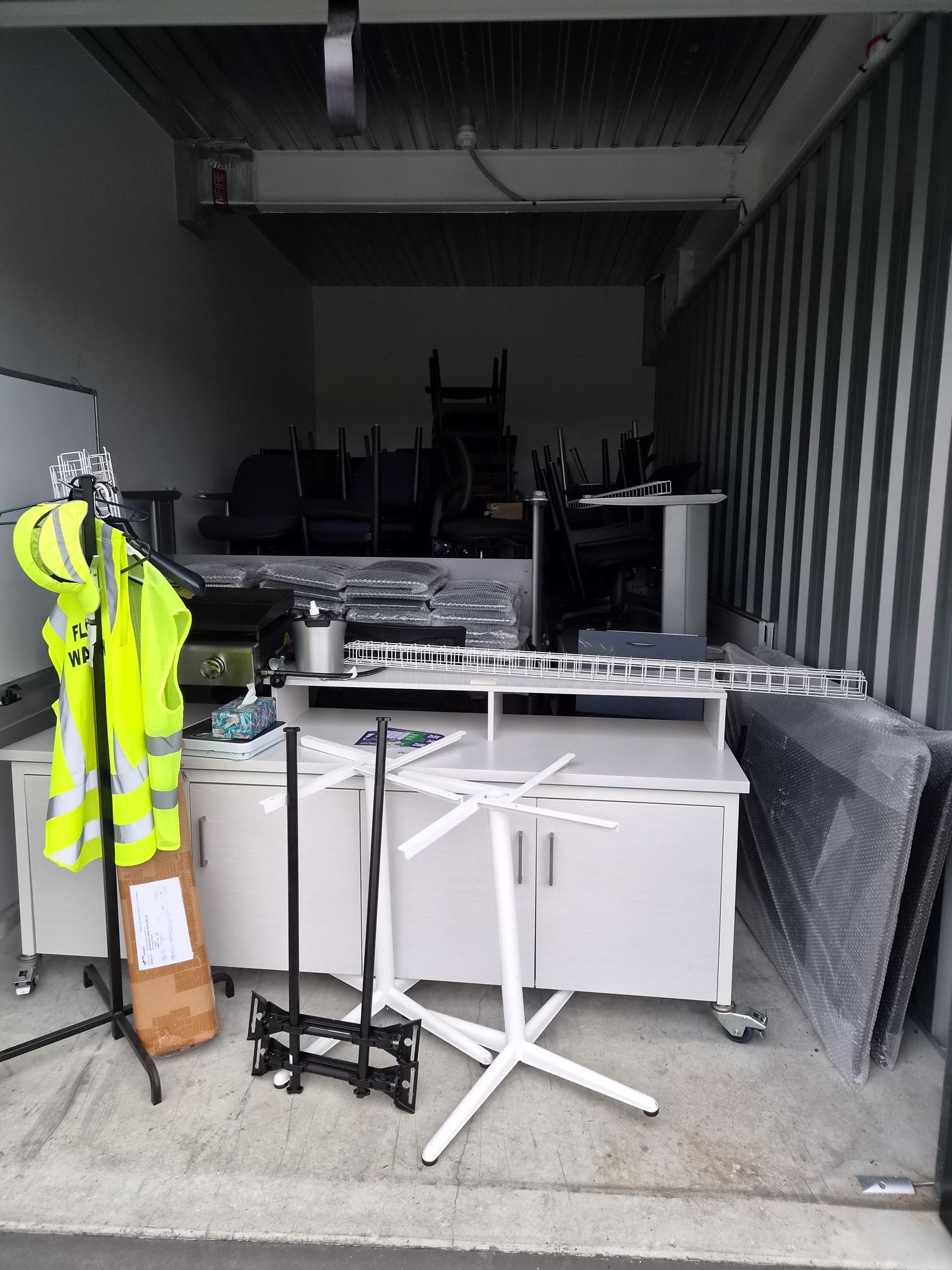 Workstations, seating and storage cabinets organised and protected after a Waikato office relocation