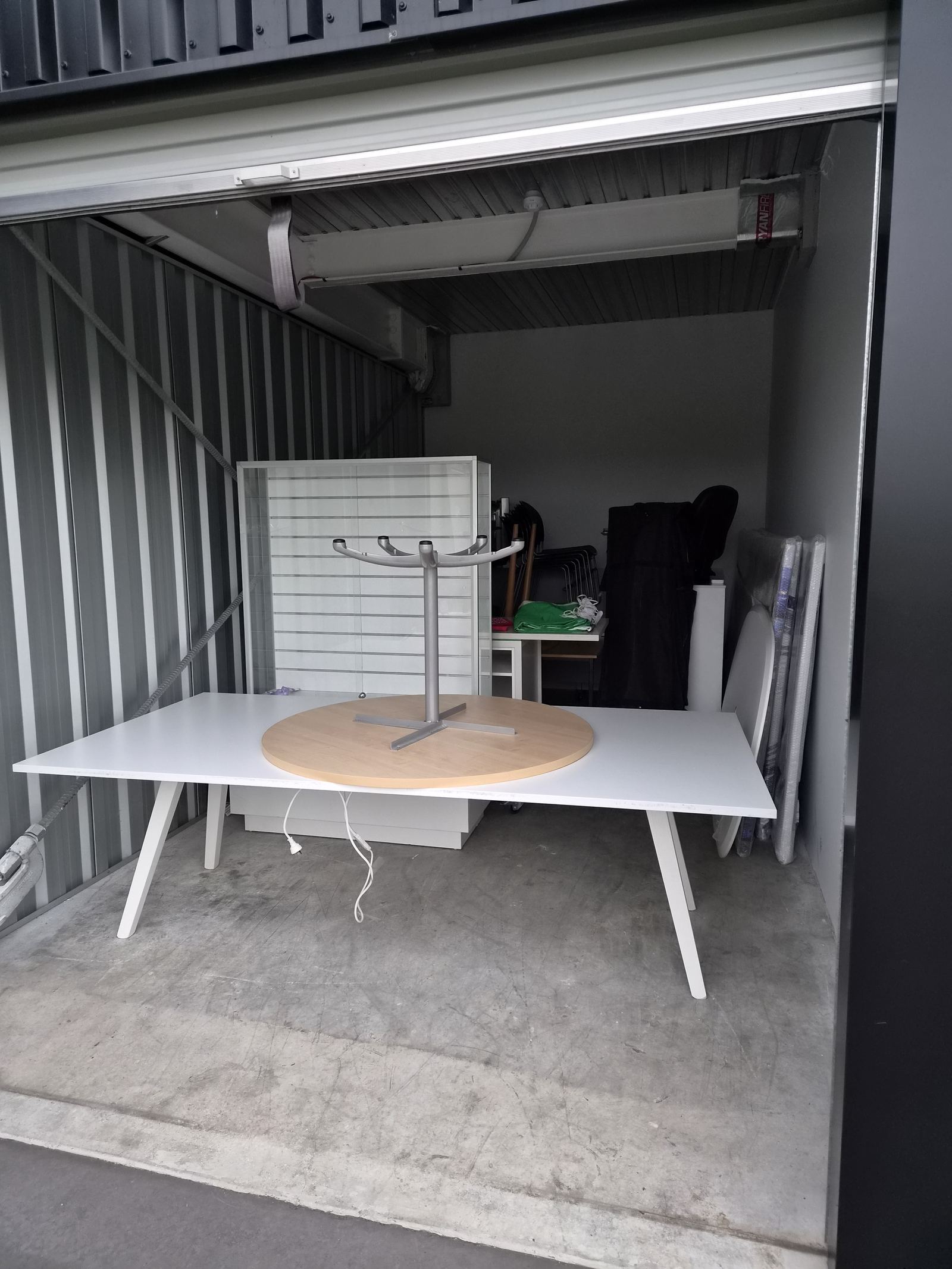 Meeting room and reception furniture placed and ready for reassembly after a Waikato office move
